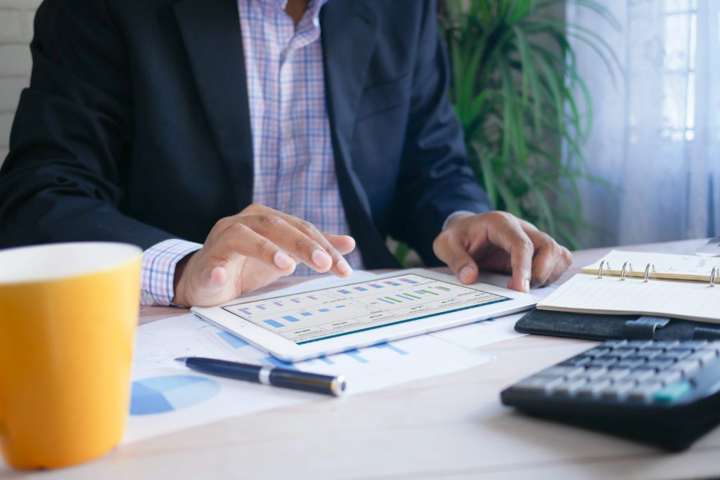 a hospital leader looking at labor statistics