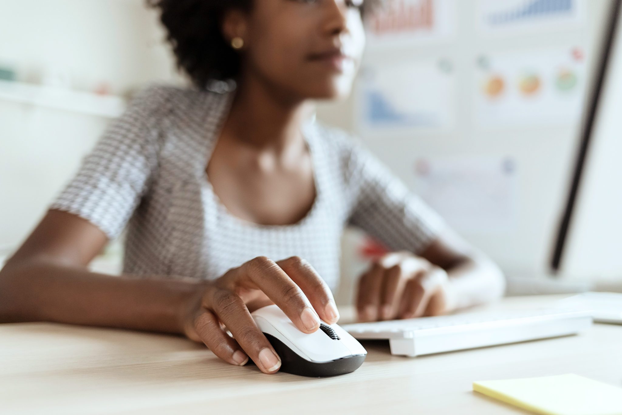 a healthcare finance executive creating a budget on a computer